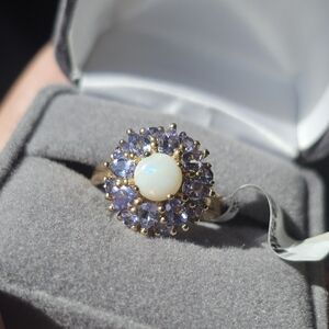New. 10k Australian opal & tanzanite ring size 7. Stamped 10k. New with tags. Gr
